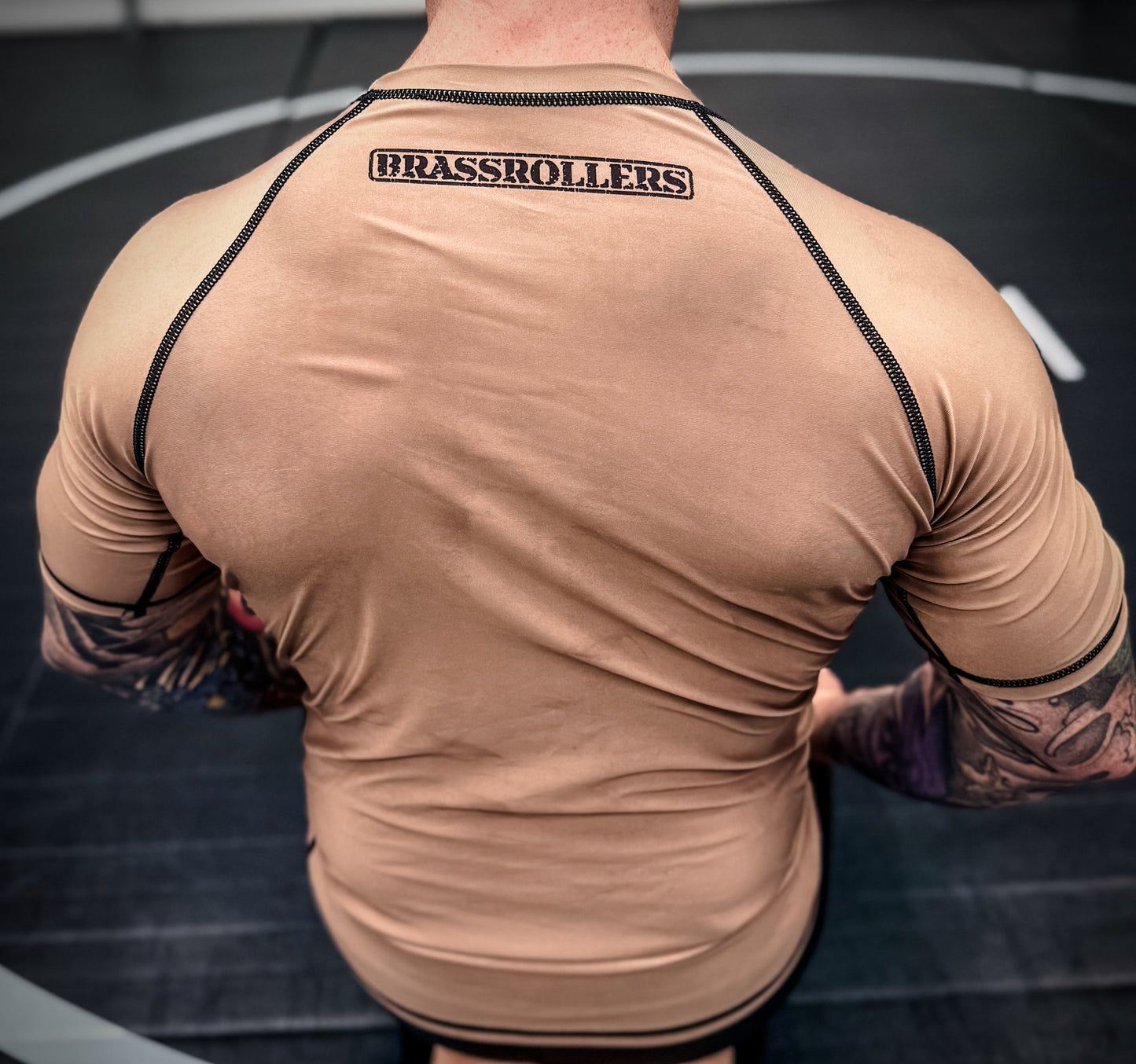 Complacency Kills Rash Guard Dark Earth