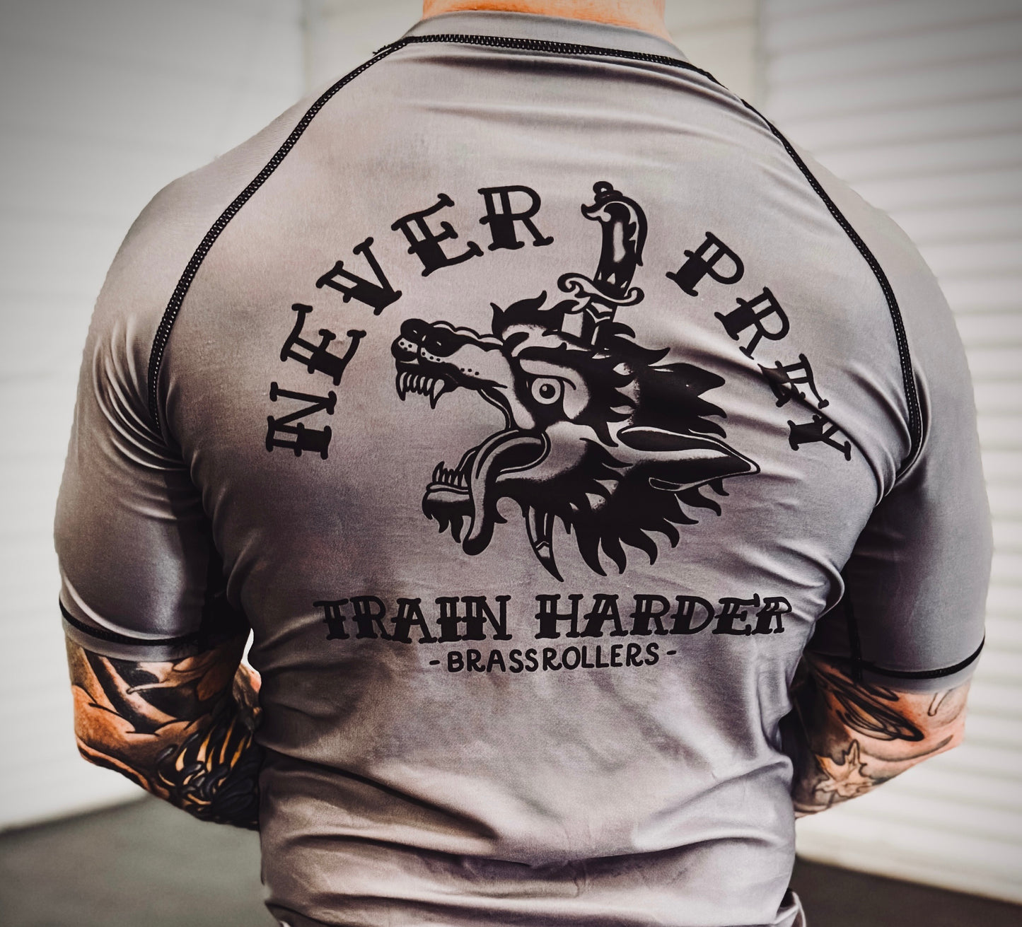 Never Prey Rash Guard