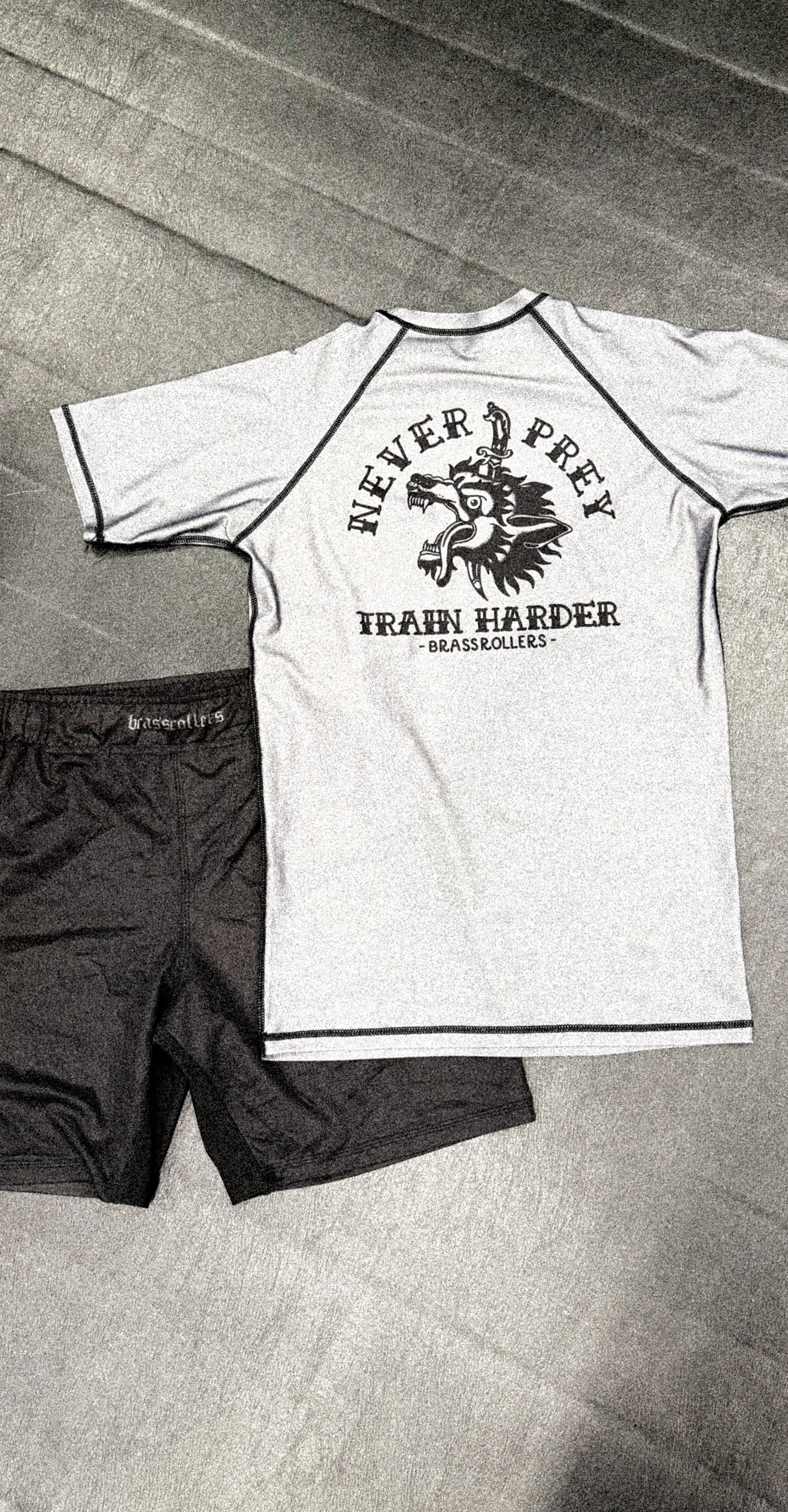 Never Prey Rash Guard