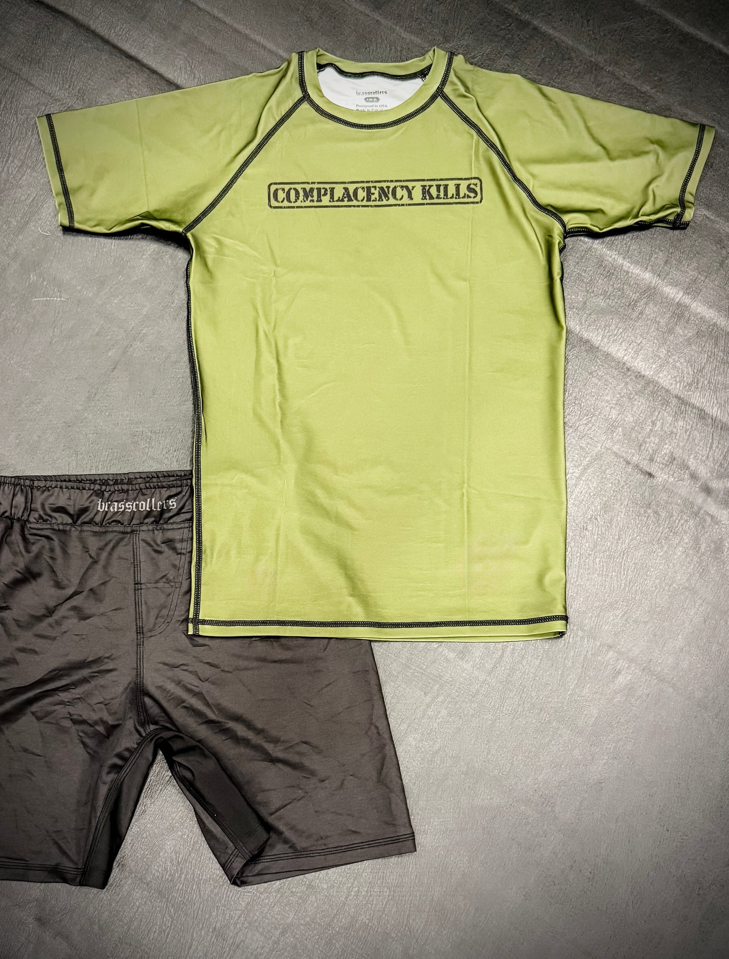 Complacency Kills Rash Guard OD Green